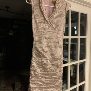 Mid calf elegant dress fitted. Dress is size small and I am 5’8 125lbs.